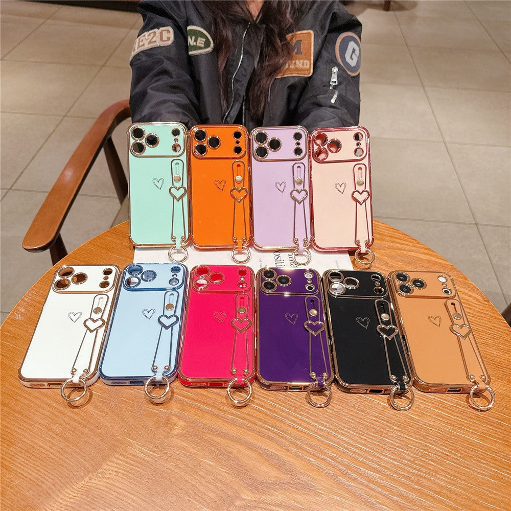 For iPhone 17 Pro Max Case Electroplated Heart Pattern TPU Phone Back Cover with Wristband Kickstand