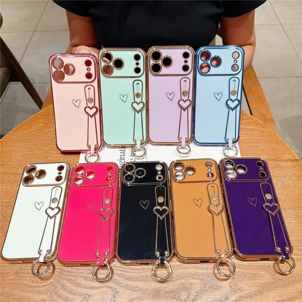 For iPhone 17 Pro Case Electroplated Heart Pattern TPU Phone Back Cover with Wristband Kickstand